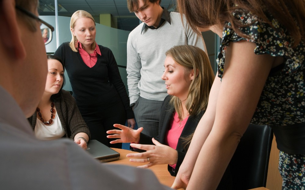 Team meets, keeping communication open